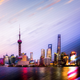 Illustration for article titled Stunning photographs capture day and night of Shanghai and Hong Kong